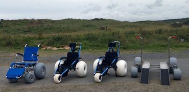 Sandcruiser wheelchair, hippocampe wheelchairs, nomad desert platform lined up on Balmedie beach