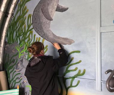 Our artist, Joni Corbett, painting the under sea mural inside The Bunker on Balmedie beach